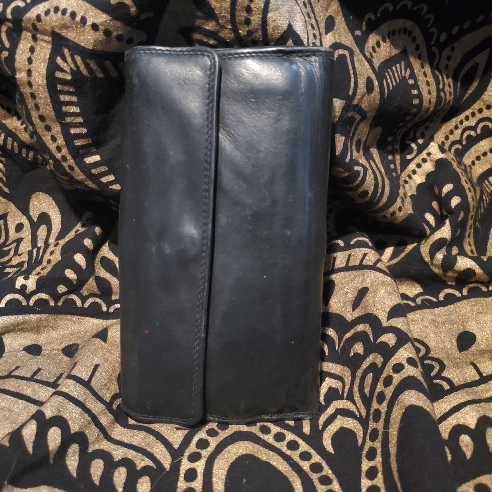 Beautiful soft leather wallet with loads of space for cards and multiple zippers